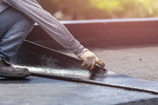 Professional Basement Waterproofing technician working in Pompton Plains, NJ
